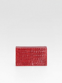 Sumptuous croc-skin crafted in a sleek and structured box silhouette.Magnetic top closureOne inside open pocketSatin lining6W X 3½H X 2DImported Sumptuous croc-skin crafted in a sleek and structured box silhouette.Magnetic top closureOne inside open pocketSatin lining6W X 3½H X 2DImported