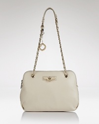 Covet this round DKNY crossbody as a curvy take on the quintessential day-to-night bag, crafted of smooth leather and topped with a zip closure. Covet this round DKNY crossbody as a curvy take on the quintessential day-to-night bag, crafted of smooth leather and topped with a zip closure.
