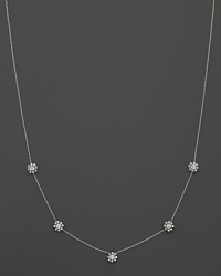 Five faceted diamond stations bloom on an 18K white gold necklace. By Roberto Coin. Five faceted diamond stations bloom on an 18K white gold necklace. By Roberto Coin.