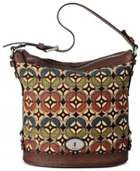 Simple and seriously chic, this classic bucket bag from Fossil reels in old school charm with a contemporary attitude. Mod tapestry, leather trim and signature hardware add depth and dimension, while the spacious interior stashes your everyday essentials with ease. Simple and seriously chic, this classic bucket bag from Fossil reels in old school charm with a contemporary attitude. Mod tapestry, leather trim and signature hardware add depth and dimension, while the spacious interior stashes your everyday essentials with ease.