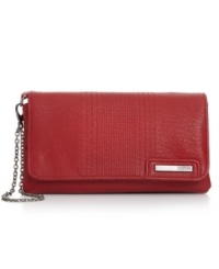 You won't ever want to leave home without this slim silhouette from Kenneth Cole Reaction. Convenient wristlet strap offers perfect portability, while separate zip compartments, card slots and ID window organize your essentials with ease. You won't ever want to leave home without this slim silhouette from Kenneth Cole Reaction. Convenient wristlet strap offers perfect portability, while separate zip compartments, card slots and ID window organize your essentials with ease.