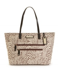 A Macy's exclusive! This Calvin Klein tote features 2 front zip pockets and a roomy interior, and it's available in a range of colors prints. A great bag for every day. A Macy's exclusive! This Calvin Klein tote features 2 front zip pockets and a roomy interior, and it's available in a range of colors prints. A great bag for every day.