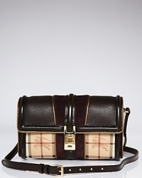 A checked motif lends easy elegance to this compact Burberry handbag, subtly detailed with a gleaming turnlock closure. A checked motif lends easy elegance to this compact Burberry handbag, subtly detailed with a gleaming turnlock closure.