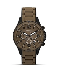 Solid and stylish, this brushed gunmetal watch from MARC BY MARC JACOBS with a silicone bracelet, date feature, bold accents, and chronograph movement will take your style up a tick. Wear it to sharpen your look. Solid and stylish, this brushed gunmetal watch from MARC BY MARC JACOBS with a silicone bracelet, date feature, bold accents, and chronograph movement will take your style up a tick. Wear it to sharpen your look.