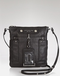 Sleek and chic, Marc by Marc Jacob's stripped-down crossbody is the city girl's ideal carry-all. A multitude of pockets keeps all your necessities organized. Sleek and chic, Marc by Marc Jacob's stripped-down crossbody is the city girl's ideal carry-all. A multitude of pockets keeps all your necessities organized.