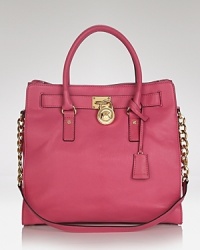 Clean and simply detailed, this versatile MICHAEL Michael Kors carryall will make a timeless addition to your accessory repertoire. Carry it for effortless style on-duty or off. Clean and simply detailed, this versatile MICHAEL Michael Kors carryall will make a timeless addition to your accessory repertoire. Carry it for effortless style on-duty or off.