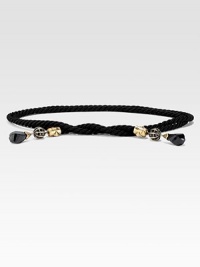 A corded style with spherical pendant embellishments. Black cord with antique brass and Swarovski spherical pendantsSelf-tie for versatilityWidth, about .5Made in Italy A corded style with spherical pendant embellishments. Black cord with antique brass and Swarovski spherical pendantsSelf-tie for versatilityWidth, about .5Made in Italy