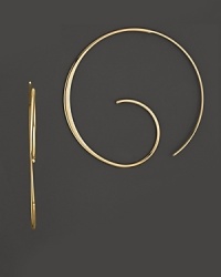 Swirl hoop earrings in yellow gold. Swirl hoop earrings in yellow gold.