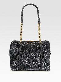 Allover sequined design with leather trim and chain link straps.Double leather and chain link shoulder strap, 10½ dropTop zip closureOne inside zip pocketTwo inside open pocketsSatin lining9½W X 7¼H X 6DMade in Italy Allover sequined design with leather trim and chain link straps.Double leather and chain link shoulder strap, 10½ dropTop zip closureOne inside zip pocketTwo inside open pocketsSatin lining9½W X 7¼H X 6DMade in Italy