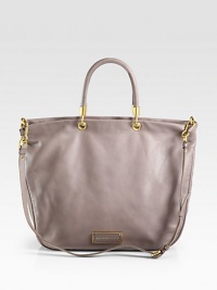 Sophisticated yet practical, this roomy design of pebble-grain calfskin is a timeless casual staple. Adjustable detachable shoulder strap, 21-22 dropDouble top handles, 8 dropMagnetic snap closureOne inside zip pocketTwo inside open pocketsFully lined18¾W X 13½H X 6DImported Sophisticated yet practical, this roomy design of pebble-grain calfskin is a timeless casual staple. Adjustable detachable shoulder strap, 21-22 dropDouble top handles, 8 dropMagnetic snap closureOne inside zip pocketTwo inside open pocketsFully lined18¾W X 13½H X 6DImported