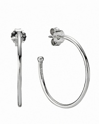 In smooth sterling silver, PANDORA's medium hoop earrings await your favorite charms. In smooth sterling silver, PANDORA's medium hoop earrings await your favorite charms.