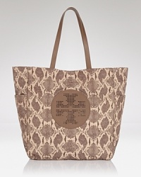 Clean lines and a strong shape makes Tory Burch's tote bag both classic and modern. Crafted from durable nylon and trimmed in leather, it's a practically perfect for running errands. Clean lines and a strong shape makes Tory Burch's tote bag both classic and modern. Crafted from durable nylon and trimmed in leather, it's a practically perfect for running errands.