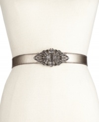 Let the light shine in with this shimmery leather belt from Fossil. Graced with a scrolling metal clasp encrusted with rhinestone embellishments. Let the light shine in with this shimmery leather belt from Fossil. Graced with a scrolling metal clasp encrusted with rhinestone embellishments.
