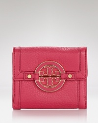 Cast in rich leather with a simple, streamlined shape, this practical piece from Tory Burch is an effortless choice for organizing the essentials. Cast in rich leather with a simple, streamlined shape, this practical piece from Tory Burch is an effortless choice for organizing the essentials.