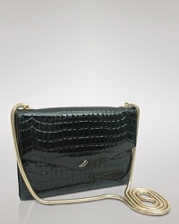 Take after hours into exotic overdrive with Tusk's croc-embossed clutch. The chain-clad compact shines all night, so pair it with a cocktail frock and booties for lasting soirée chic. Take after hours into exotic overdrive with Tusk's croc-embossed clutch. The chain-clad compact shines all night, so pair it with a cocktail frock and booties for lasting soirée chic.