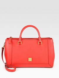 A saffiano leather design that possesses the character of German functionality and craftsmanship.Double top handles, 5¼ dropDetachable adjustable shoulder strap, 17-21 dropThree inner compartments; two zip and one magnetic flap closureProtective metal feetOne inside zip pocketFully lined14W X 8½H X 6½DMade in Italy A saffiano leather design that possesses the character of German functionality and craftsmanship.Double top handles, 5¼ dropDetachable adjustable shoulder strap, 17-21 dropThree inner compartments; two zip and one magnetic flap closureProtective metal feetOne inside zip pocketFully lined14W X 8½H X 6½DMade in Italy