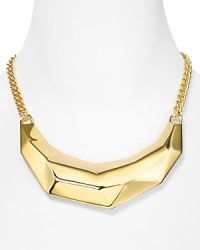 Geometry plays muse to this Kenneth Jay Lane bib necklace, cast in 22-karat gold plate with a shapely frontal showpiece. Geometry plays muse to this Kenneth Jay Lane bib necklace, cast in 22-karat gold plate with a shapely frontal showpiece.