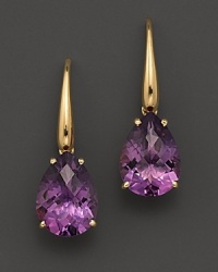An elegant amethyst drop earring in 18 Kt. yellow gold. With Roberto Coin's signature ruby accents. An elegant amethyst drop earring in 18 Kt. yellow gold. With Roberto Coin's signature ruby accents.