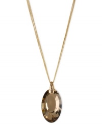 Become the center of attention with this pendant necklace from Kenneth Cole New York. Crafted from gold-tone mixed metal, the chains hold a stunning topaz-colored oval pendant with glistening accents. Item comes packaged in a signature Kenneth Cole New York Gift Box. Approximate length: 16 inches + 3-inch extender. Approximate drop: 1-3/4 inches. Become the center of attention with this pendant necklace from Kenneth Cole New York. Crafted from gold-tone mixed metal, the chains hold a stunning topaz-colored oval pendant with glistening accents. Item comes packaged in a signature Kenneth Cole New York Gift Box. Approximate length: 16 inches + 3-inch extender. Approximate drop: 1-3/4 inches.
