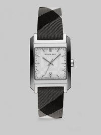 Stainless steel case with check print strap. Quartz movement Water resistant to 5 ATM Rectangular stainless steel case, 25mm (1) X 29 (1.1) Smooth bezel Check etched dial Bar hour markers Date display at 6 o'clock Second hand Beat check strap, 16mm wide (0.6) Made in Switzerland Stainless steel case with check print strap. Quartz movement Water resistant to 5 ATM Rectangular stainless steel case, 25mm (1) X 29 (1.1) Smooth bezel Check etched dial Bar hour markers Date display at 6 o'clock Second hand Beat check strap, 16mm wide (0.6) Made in Switzerland
