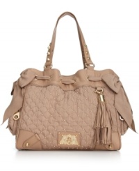 If you dream in couture, this luxe lovely from Juicy Couture will make every day sweeter. Charming grosgrain bows, chic stud detailing and signature accents adorn the outside, while the pocket-line interior keeps essentials safely tucked away. If you dream in couture, this luxe lovely from Juicy Couture will make every day sweeter. Charming grosgrain bows, chic stud detailing and signature accents adorn the outside, while the pocket-line interior keeps essentials safely tucked away.