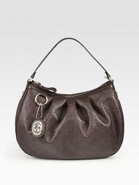 Pleated Guccissima leather design with a GG logo charm. Single strap, 8 drop Top-zip closure One inside zip pocket Two inside open pockets Natural cotton linen lining 15¾W X 12H X 4¾D Made in Italy Pleated Guccissima leather design with a GG logo charm. Single strap, 8 drop Top-zip closure One inside zip pocket Two inside open pockets Natural cotton linen lining 15¾W X 12H X 4¾D Made in Italy