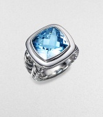 From the Albion Collection. A radiant faceted blue topaz shimmers within a smooth setting and double cable band of sterling silver. Blue topaz Sterling silver About ¾ square Imported