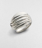 A high fluted dome of sterling silver is effortlessly chic.Sterling silver Imported