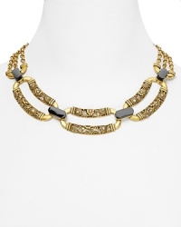 A Deco-inspired showpiece from T Tahari, this bold necklace brings instant glamor to your look, cast in plated metal with rich stone detailing. A Deco-inspired showpiece from T Tahari, this bold necklace brings instant glamor to your look, cast in plated metal with rich stone detailing.