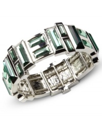 Green with envy. This Nine West bracelet showcases captivating plastic erinite stones set in a sleek setting. Stretches to fit wrist. Crafted in imitation rhodium tone mixed metal. Approximate diameter: 2 inches. Green with envy. This Nine West bracelet showcases captivating plastic erinite stones set in a sleek setting. Stretches to fit wrist. Crafted in imitation rhodium tone mixed metal. Approximate diameter: 2 inches.