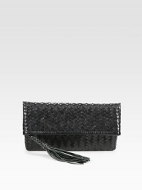Ultra-luxe Italian leather is intricately woven on this chic foldover design. Top zip closure with tasselSatin lining11W X 6H X ¾DMade in Italy Ultra-luxe Italian leather is intricately woven on this chic foldover design. Top zip closure with tasselSatin lining11W X 6H X ¾DMade in Italy