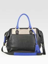 The perfect carryall in beautiful, pebbled leather with a colorblock design and animal-printed leather accent.Double top handles, 5.5 dropAdjustable shoulder strap, 15.5 to 17.5 dropTop zip closureOne inside zip pocketThree inside open pocketsFully lined13W X 11H X 5.75DImported The perfect carryall in beautiful, pebbled leather with a colorblock design and animal-printed leather accent.Double top handles, 5.5 dropAdjustable shoulder strap, 15.5 to 17.5 dropTop zip closureOne inside zip pocketThree inside open pocketsFully lined13W X 11H X 5.75DImported
