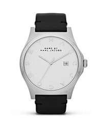 Give your hourly look a hit of MARC BY MARC JACOBS' style with boldly sized watch. Crafted of plated stainless steel, it features a leather strap and logo-detailed face. Give your hourly look a hit of MARC BY MARC JACOBS' style with boldly sized watch. Crafted of plated stainless steel, it features a leather strap and logo-detailed face.