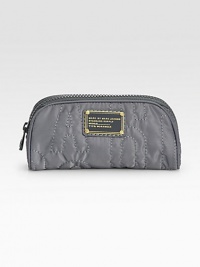 Stash your essentials in this mini nylon bag, finished with signature letter stitching.Top zip closureNylon lining7W X 3½H X 3DImportedBoxed for giving Stash your essentials in this mini nylon bag, finished with signature letter stitching.Top zip closureNylon lining7W X 3½H X 3DImportedBoxed for giving