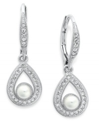 Polished and poised. Eliot Danori's teardrop earrings feature crystal accents and a simulated pearl (4 mm) with genuine mother-of-pearl coating. Finished with a leverback closure. Crafted in rhodium-plated mixed metal. Approximate drop: 1/2 inch. Polished and poised. Eliot Danori's teardrop earrings feature crystal accents and a simulated pearl (4 mm) with genuine mother-of-pearl coating. Finished with a leverback closure. Crafted in rhodium-plated mixed metal. Approximate drop: 1/2 inch.