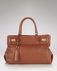 Just right for work or weekend, this soft leather tote captures the signature luxe Salvatore Ferragamo is know for. Just right for work or weekend, this soft leather tote captures the signature luxe Salvatore Ferragamo is know for.