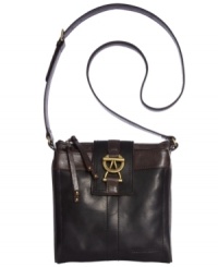 Embrace a vintage vibe with this exquisite everyday organizer from Tignanello. Crafted from supple leather and accented with signature detailing, it flaunts multiple pockets for effortless go-everywhere accessorizing. Embrace a vintage vibe with this exquisite everyday organizer from Tignanello. Crafted from supple leather and accented with signature detailing, it flaunts multiple pockets for effortless go-everywhere accessorizing.
