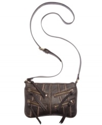 Urban-cool with a laidback attitude, this mighty mini from Marc New York is ready for adventure. Distressed leather is paired with zip pockets and tassel pulls, for a standout free-spirited style. Urban-cool with a laidback attitude, this mighty mini from Marc New York is ready for adventure. Distressed leather is paired with zip pockets and tassel pulls, for a standout free-spirited style.