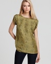 Rendered in luxe silk, this Rachel Zoe top makes a bright addition to your workday essentials.