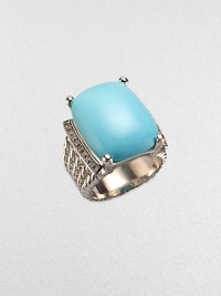 From the Wheaton Collection. A rich turquoise stone accented in dazzling diamonds on a sterling silver cabled shank.TurquoiseDiamonds, .27 tcwSterling silverImported From the Wheaton Collection. A rich turquoise stone accented in dazzling diamonds on a sterling silver cabled shank.TurquoiseDiamonds, .27 tcwSterling silverImported