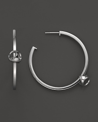 Di MODOLO's sleek and modern earrings show off the brand's signature shape on a smooth, clean hoop. Di MODOLO's sleek and modern earrings show off the brand's signature shape on a smooth, clean hoop.