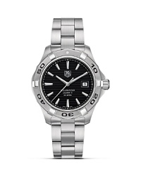 TAG Heuer's Aquaracer series is the reference professional diving watch. With a black dial with horizontal stripe effect and water resistance to 300M. TAG Heuer's Aquaracer series is the reference professional diving watch. With a black dial with horizontal stripe effect and water resistance to 300M.