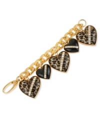 Wild at heart. This chain bracelet from Betsey Johnson is crafted from gold-tone mixed metal with black heart glass stones with crystal accents, some of which are styled with leopard print for a bit of animal attraction. Approximate length: 7-1/2 inches. Wild at heart. This chain bracelet from Betsey Johnson is crafted from gold-tone mixed metal with black heart glass stones with crystal accents, some of which are styled with leopard print for a bit of animal attraction. Approximate length: 7-1/2 inches.
