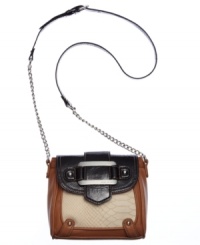 Opt for urban-cool in your everyday accessorizing with this colorblock crossbody from Nine West. Slim with signature detailing and chain-link accents, it stashes all your girl-about-town essentials with ease. Opt for urban-cool in your everyday accessorizing with this colorblock crossbody from Nine West. Slim with signature detailing and chain-link accents, it stashes all your girl-about-town essentials with ease.