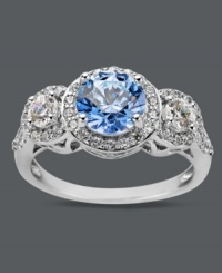 Elegance defined. Arabella's stunning three stone ring highlights a round-cut blue Swarovski zirconia (2-1/4 ct. t.w.) and dozens of round-cut white zirconias (1-1/8 ct. t.w.). Crafted in sterling silver. Size 7. Elegance defined. Arabella's stunning three stone ring highlights a round-cut blue Swarovski zirconia (2-1/4 ct. t.w.) and dozens of round-cut white zirconias (1-1/8 ct. t.w.). Crafted in sterling silver. Size 7.