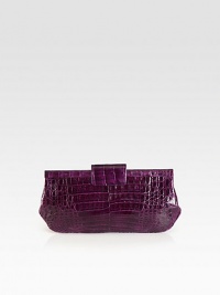 Fierce style at your hands with a textured crocodile body lined in super-soft suede. Clasp closure Inside zipper pocket Suede lining 10¼W X 4¾H X 1D Imported Fierce style at your hands with a textured crocodile body lined in super-soft suede. Clasp closure Inside zipper pocket Suede lining 10¼W X 4¾H X 1D Imported