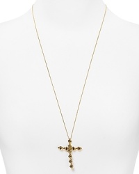 Cast in 14-karat gold and gunmetal plate, this House of Harlow 1960 necklace styles edgy glamor with its double sided cross pendant. Cast in 14-karat gold and gunmetal plate, this House of Harlow 1960 necklace styles edgy glamor with its double sided cross pendant.