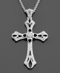A traditional sterling silver cross pendant with ornate and delicate details featuring round-cut diamonds (1/5 ct. t.w.) for a pretty shimmer. Chain measures 18 inches; drop measures 2 inches. A traditional sterling silver cross pendant with ornate and delicate details featuring round-cut diamonds (1/5 ct. t.w.) for a pretty shimmer. Chain measures 18 inches; drop measures 2 inches.