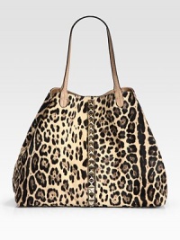 A slouchy carryall of fine Italian calf hair, finished with matte leather trim and gleaming center studs. Double leather top handles, 9 dropChain shoulder strap, 12 dropMagnetic snap closureProtective metal feetOne inside zip pocketTwo inside open pocketsCotton lining16W X 13H X 8DMade in Italy A slouchy carryall of fine Italian calf hair, finished with matte leather trim and gleaming center studs. Double leather top handles, 9 dropChain shoulder strap, 12 dropMagnetic snap closureProtective metal feetOne inside zip pocketTwo inside open pocketsCotton lining16W X 13H X 8DMade in Italy