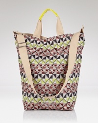 Join the color block (beach) party with this printed canvas satchel from Echo. With room for your sun loving essentials, this bag ready for exotic tripping and city zipping. Join the color block (beach) party with this printed canvas satchel from Echo. With room for your sun loving essentials, this bag ready for exotic tripping and city zipping.